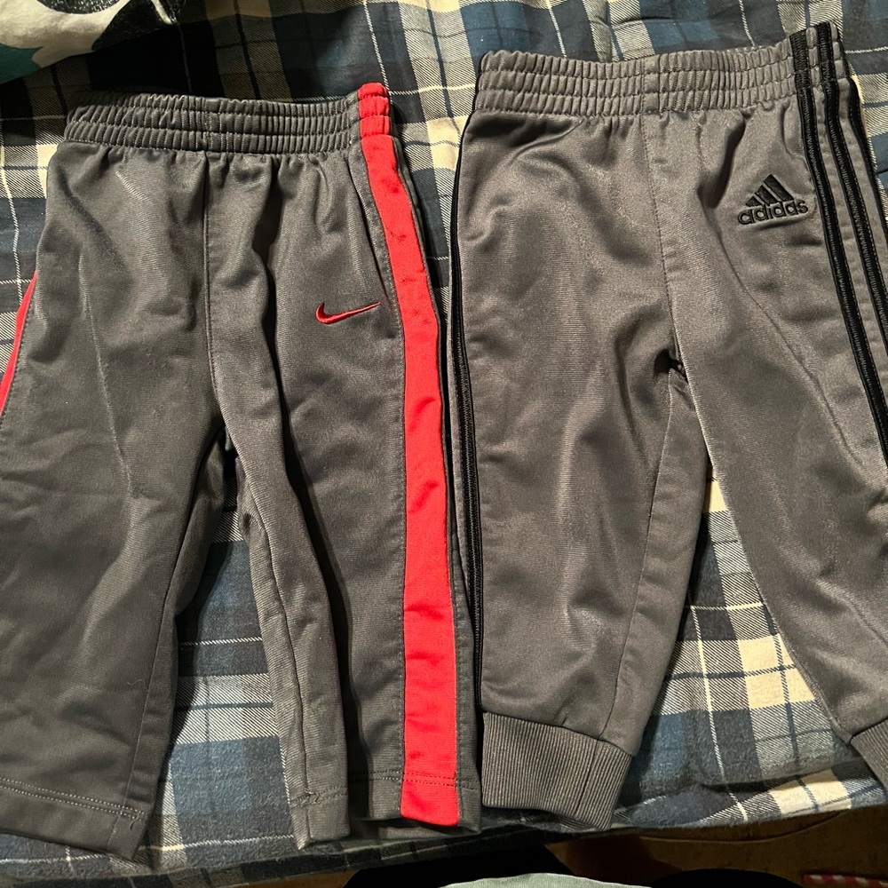 Boy Nike and Adidas pants. Nike are 6/9 months. Adidas 9 months.